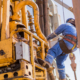 Worker Harnessed On Oil Rig